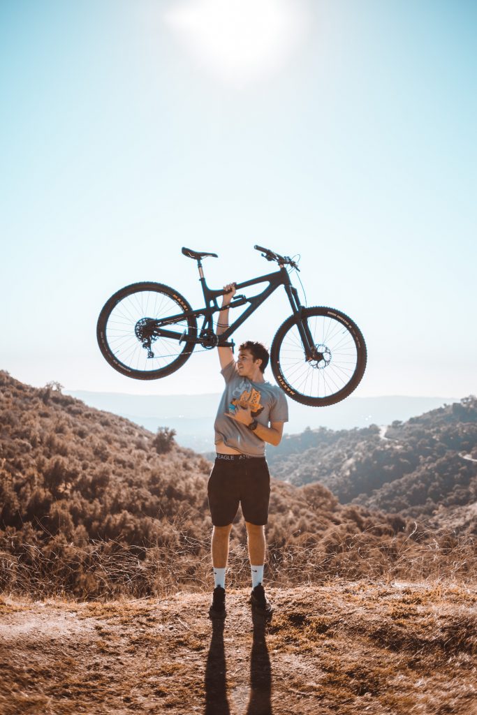 Man holding bike